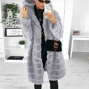 Women’s medium to long faux fur hooded coat | warm &