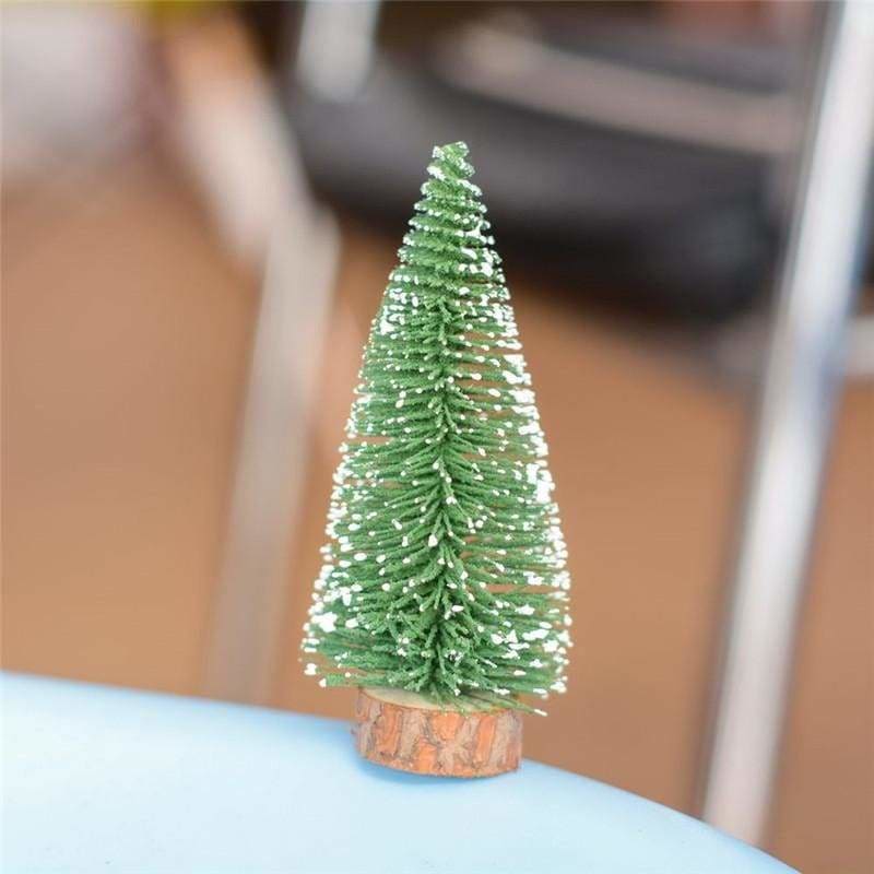 A Small Pine Tree Placed In The Desktop - Christmas